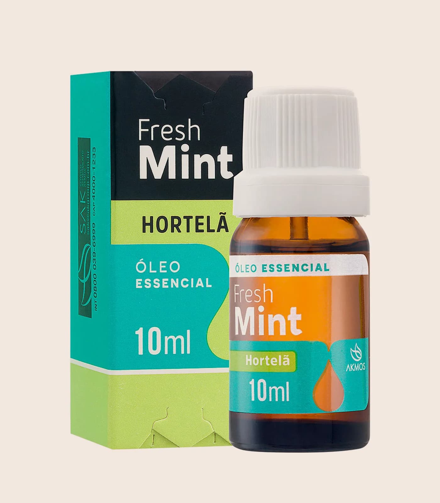 Óleo essencial de hortelã Fresh Mint, embalagem Akmos sobre fundo areia.