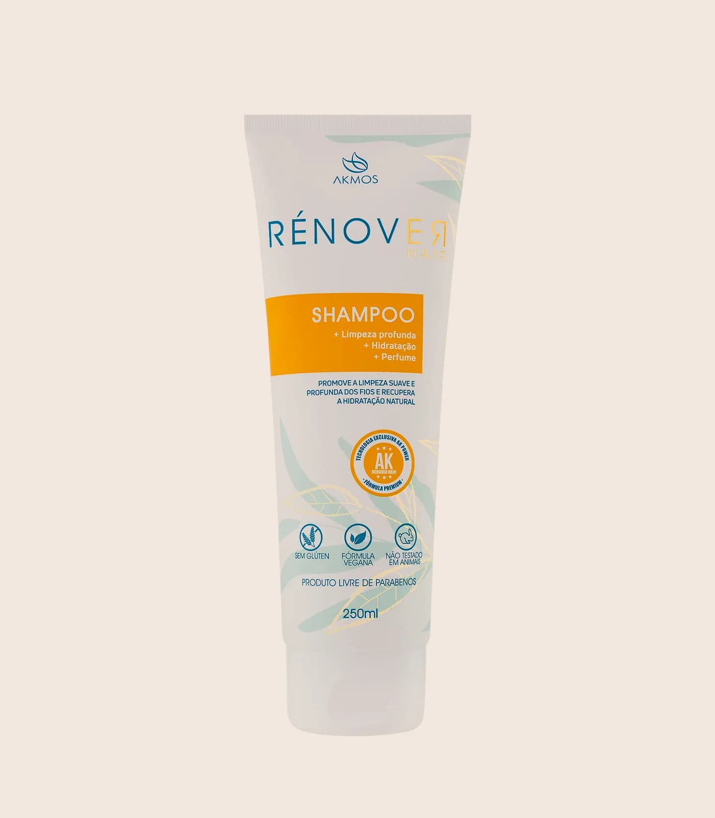 Shampoo Rénover Hair, embalagem Akmos sobre fundo areia.